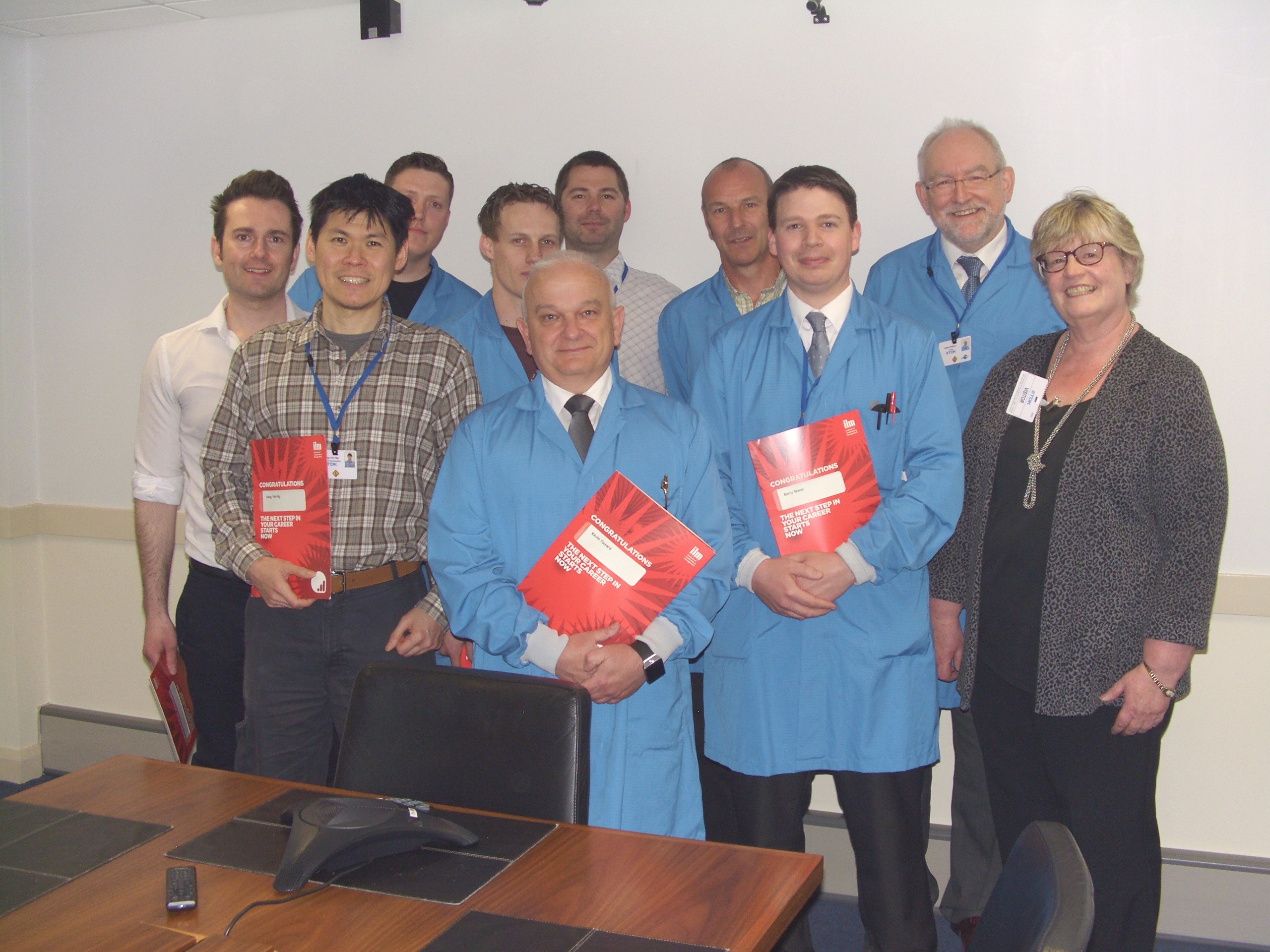  Adam Rawicz, Managing Director at TDK-Lambda EMEA (2nd R), & Sharon Wingate, QLM trainer (far R), congratulate ILM graduates